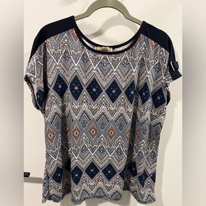 Lavish Blue Pattern top great for layering under suit or pairing with jeans